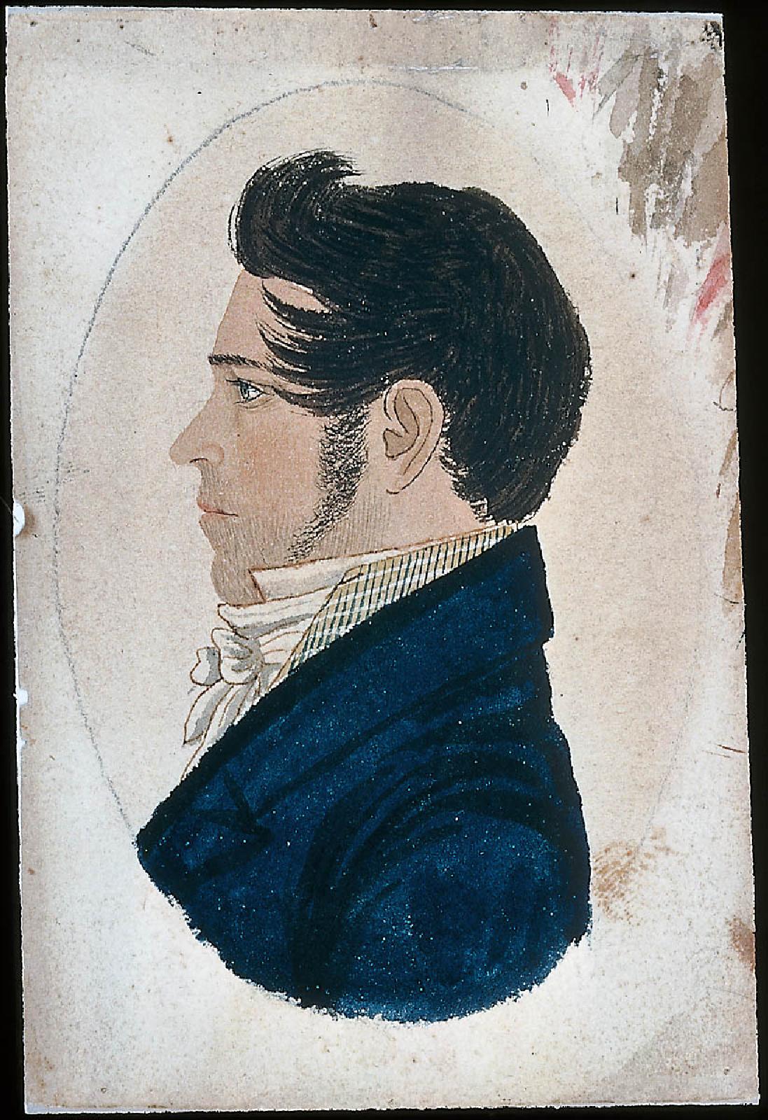 Side profile portrait of a young man with black hair wearing a blue jacket and white shirt with high collar.